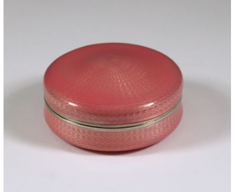An Early 20th Century Silver, Silver Gilt and Pink Enamel Circular Box, with import mark Erich Kellerman, London 1913, with s