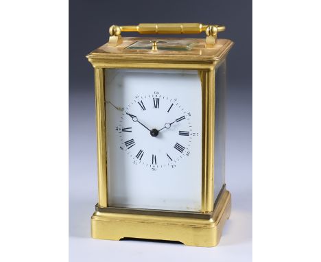 A Late 19th Century French Gilt Brass Carriage Clock, the white enamel dial with Roman numerals, to the eight day two train m