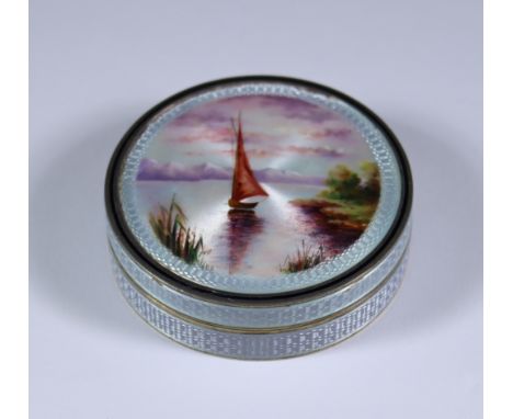 A Late 19th/Early 20th Century Continental (possibly French) Silver and Enamel Circular Box, the lid decorated with a sailing