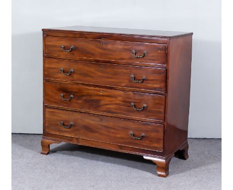 A Late George III Mahogany Chest, with twin reeded edge to top, fitted four long graduated drawers, on ogee bracket feet, 39i