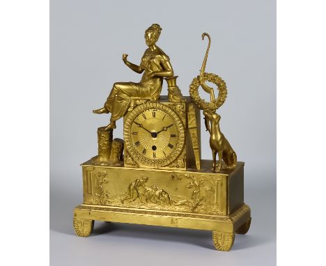 An Early 19th Century French Gilt Metal Cased Mantel Timepiece, the 3.25ins dial with Roman numerals, to an eight day movemen