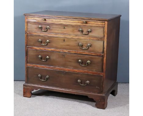 A George III Mahogany Chest, with moulded edge to top, fitted with a brushing slide and four long graduated drawers, on brack