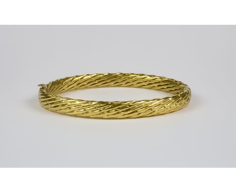 An 18ct Gold Bangle, Modern, 200mm circumference, gross weight 11g