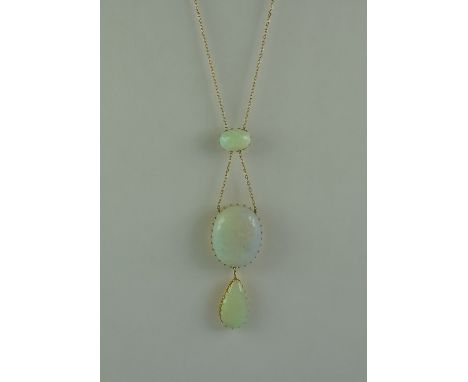 A Three Stone Opal Pendant, Modern, comprising - two oval and one pear shaped opals,  approximate opal weight 20cts, set in y