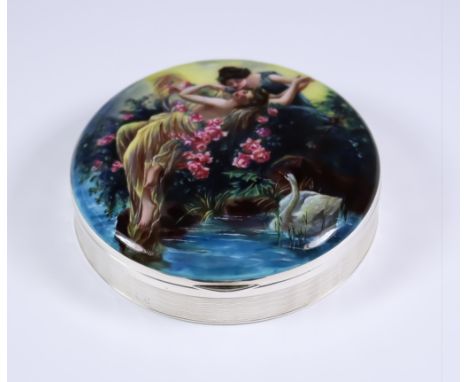 A Late 19th/ Early 20th Century German Silver and Enamel Circular Box, by E & W, stamped 935 standard, the lid decorated with