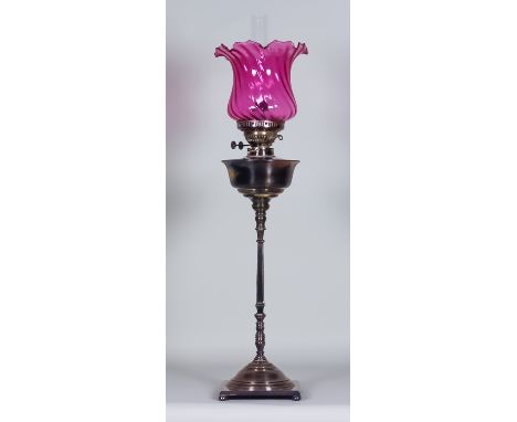 A Victorian Plated Oil Lamp with Plain Reservoir, on square slender turned central column and square base, 24ins high, and cr