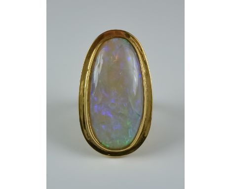 A Cabochon Opal Dress Ring, Modern,  9ct gold set with a cabochon opal, approximately 10ct, size N, gross weight 8.9g