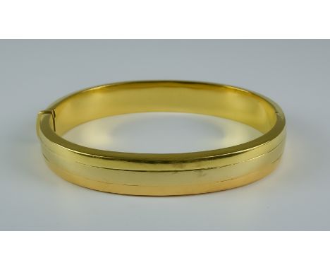 An 18ct Gold Bangle, Modern, 210mm circumference, gross weight 28g