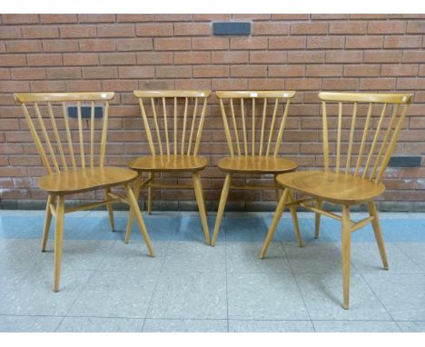 A set of four Ercol Blonde elm and beech chairs 