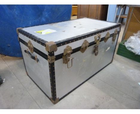 A metal bound steamer trunk 