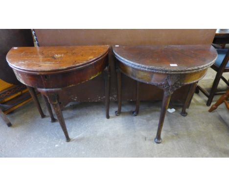 A George III Chippendale style carved mahogany demi-lune tea table and another George II mahogany demi-lune tea table 