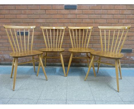 A set of four Ercol Blonde elm and beech chairs 