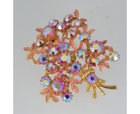 A 1950s vintage yellow metal enamelled brooch pin  in the form of spray of flowers decorated with pink enamel and pink Aurora