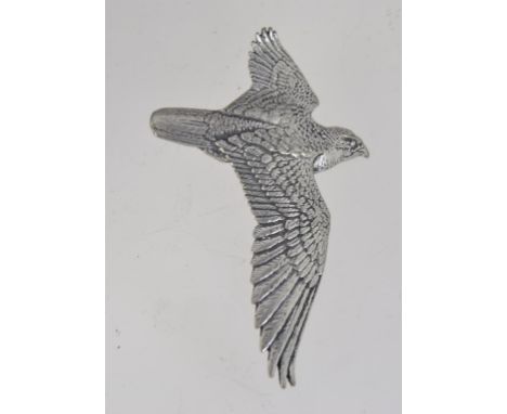 A vintage white metal brooch pin in the form of an eagle bird with inscription to verso by A R Brown. Measures 6cms.