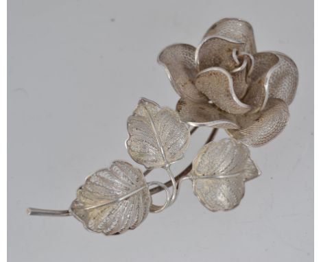 A large filigree rose brooch pin with roller clasp. Marked 15CE 900. Measures 7cms.