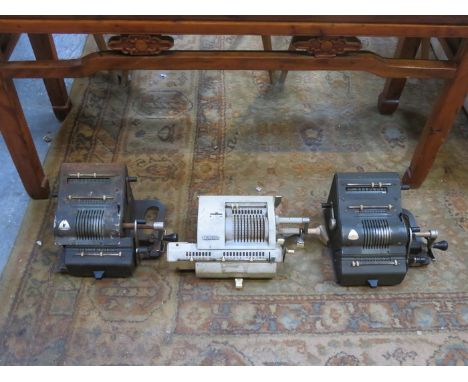 TWO VINTAGE BRUNSVIGA MANUAL ADDING MACHINES AND OLYMPIA MANUAL ADDING MACHINE 
