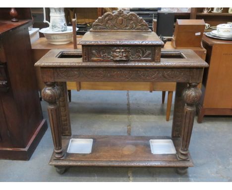 CARVED OAK STICK STAND 