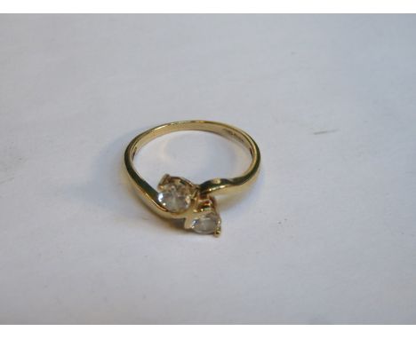 18ct GOLD CROSS OVER DRESS RING WITH TWO CLEAR STONES 