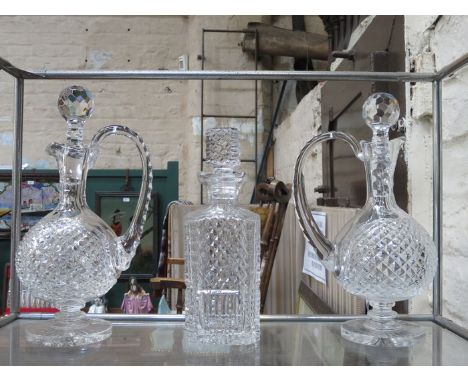 PAIR OF GLASS STEMMED WATERFORD CRYSTAL DECANTERS AND ONE OTHER DECANTER 