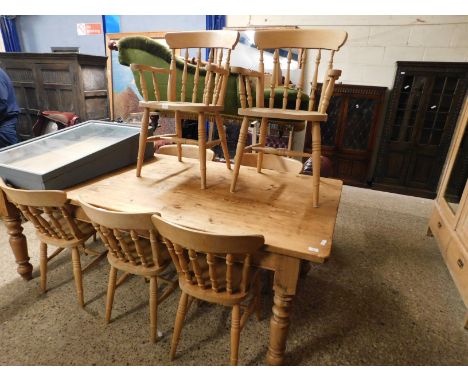 MODERN RECTANGULAR PINE FARMHOUSE KITCHEN TABLE ON TURNED LEGS TOGETHER WITH A SET OF EIGHT BEECHWOOD HARD SEATED STICK BACK 