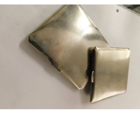 TWO SILVER ENGINE TURNED CIGARETTE CASES   