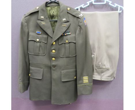 USAAF 8th Air Force Colonel Pilot's Uniformconsisting khaki, single breasted, open collar tunic.  Collar with gilt 'US' and w