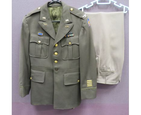 USAAF 8th Air Force Colonel Pilot's Uniformconsisting khaki, single breasted, open collar tunic.  Collar with gilt 'US' and w