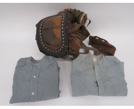 Two RAF Collarless Shirtslight blue, collarless, half front fastened, cotton shirts.  One complete with faded issue label.  S