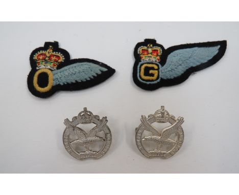 Pair of Pre 1953 Glider Pilot Regiment Collar BadgesKC silvered, facing collar badges.  Rear marked 'Firmin London'.  Lug fix