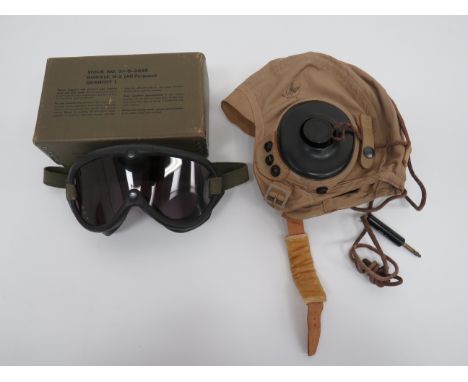 WW2 USAAF AN-H-15 Flying Helmetlight tan drill, multi panel helmet.  Large rubber side pads securing the electrical earphones