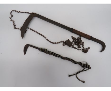 Unusual All Steel Trade Axesteel double edged pointed head. Steel shaft with side fitted flattened hook. ... Accompanied by a