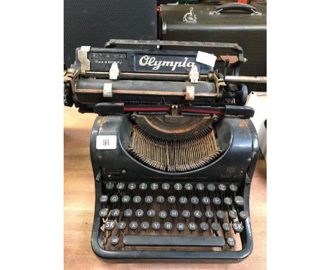 VINTAGE OLYMPIA MANUAL TYPEWRITER (RUSTY)