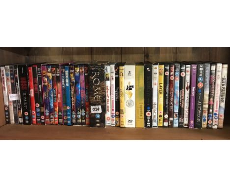 SHELF OF VARIOUS DVD'S