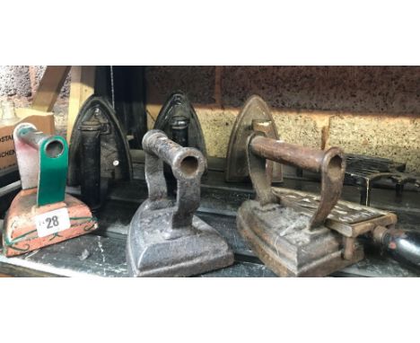 SHELF OF 6 FLAT IRONS &amp; TRIVETS 