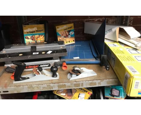 SHELF OF 2 HAND SHAKERS, BLACK &amp; DECKER JOBBER,VARIOUS PLANES, GUILLOTINE &amp; 2 FOLDABLE AXLE STANDS