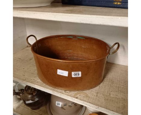 SHELF OF COPPER ITEMS