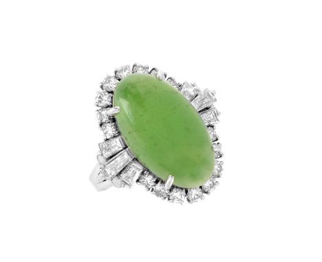 Approx. 11.21 Gem Quality Jade Cabochon, 1.15 Round and Baguette Diamond Platinum Ring. The diamonds of F-G color and VS1-VS2