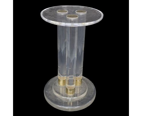 Mid Century Modern Lucite and Brass Side Table. Measures 28" H, and measures 17" dia at the top. Condition: Some light scuffs