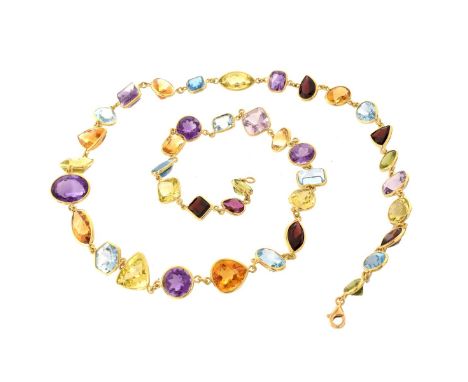 Vintage Multi Gemstone and 18 Karat Yellow Gold Necklace. Includes amethyst, aquamarine, peridot, garnet topaz and citrine. M