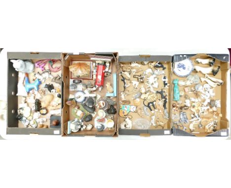 A mixed collection of ceramic, wood and resin cat figures by various manufacturers (4 trays)