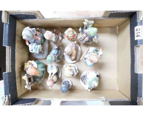 A collection of Goebel Hummel figures to include school girlchimney sweep, boy on fence, goose girl, the artist, doctor, pray