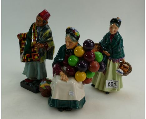 Royal Doulton character figure The Old Balloon Seller HN1315 (glaze fault to balloons), Carpet Seller HN1464 (damaged) and Th