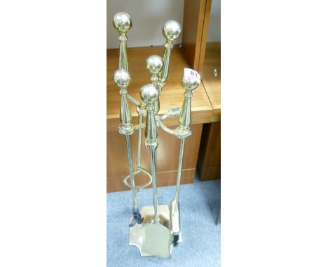 Brass fire tool set on hanging stand 