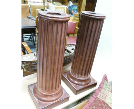 A pair of ceramic torcheres/plant stands (2)