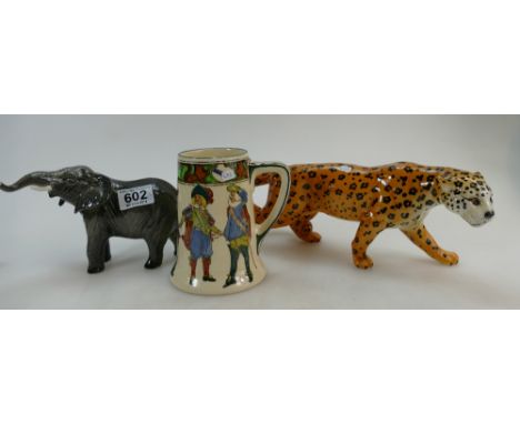 Beswick Elephant with trunk stretched 974, Leopard 1082 and Royal Doulton seriesware tankard The Three Musketeers D4749 (3)