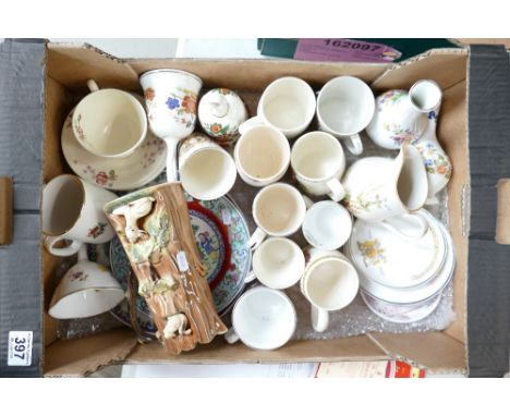 A mixed collection of items to include commemorative cups, mugs, decorative oriental influenced wall plates, Spode Royal Jasm
