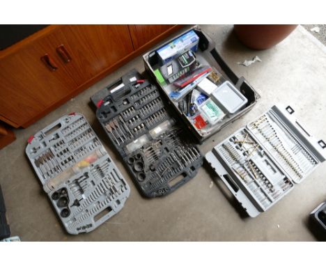 A mixed collection of tool and drill bits to include - several boxes of screws, measuring tapes, outdoor light, water feature
