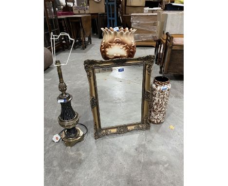 A gilt metal table lamp; a wall mirror; a jardiniere on stand and a West German vase. (4)