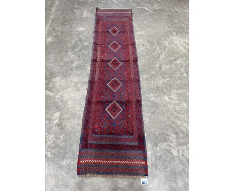 A Meshwani carpet runner. 2.5m x 0.61m 