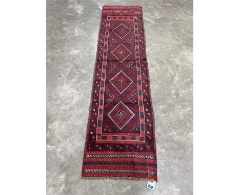 A Meshwani carpet runner 2.44m x 0.63m